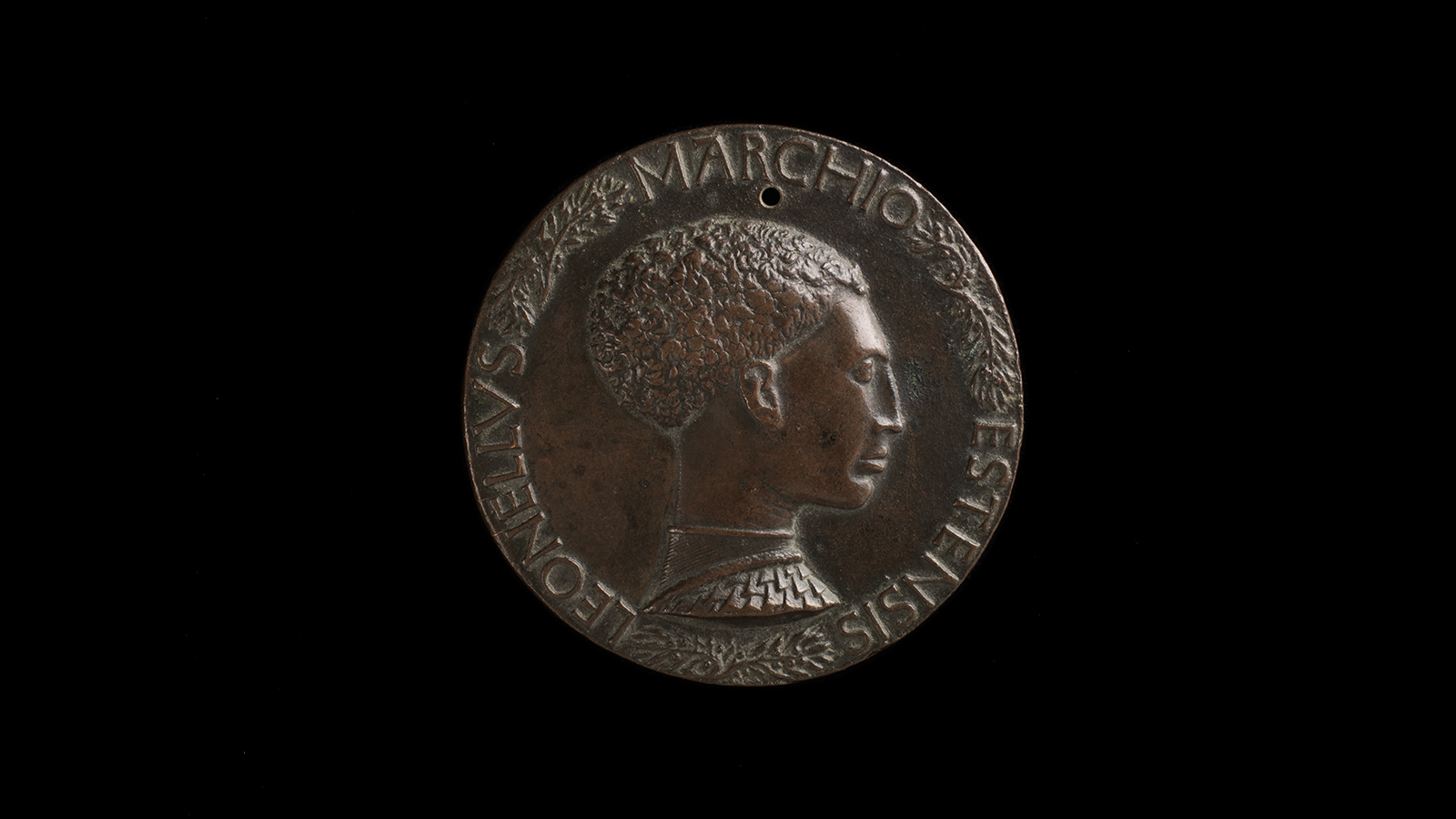 Antonio di Puccio Pisano, called Pisanello. Obverse: Leonello d’Este, Marquis of Ferrara; reverse: Head of three infantile faces. Ferrara, c. 1443. Bronze. Calouste Gulbenkian Museum