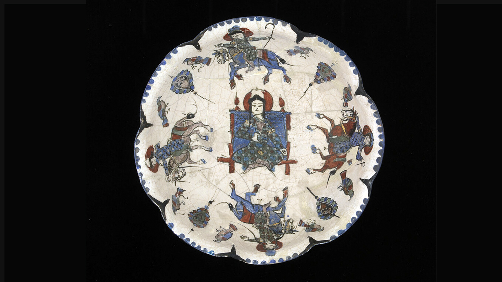 Bowl with enthroned ruler and written blessings. Iran, late 12th - early 13th century. Stonepaste, painted in and over the glaze and gilded (mina’i). Calouste Gulbenkian Museum