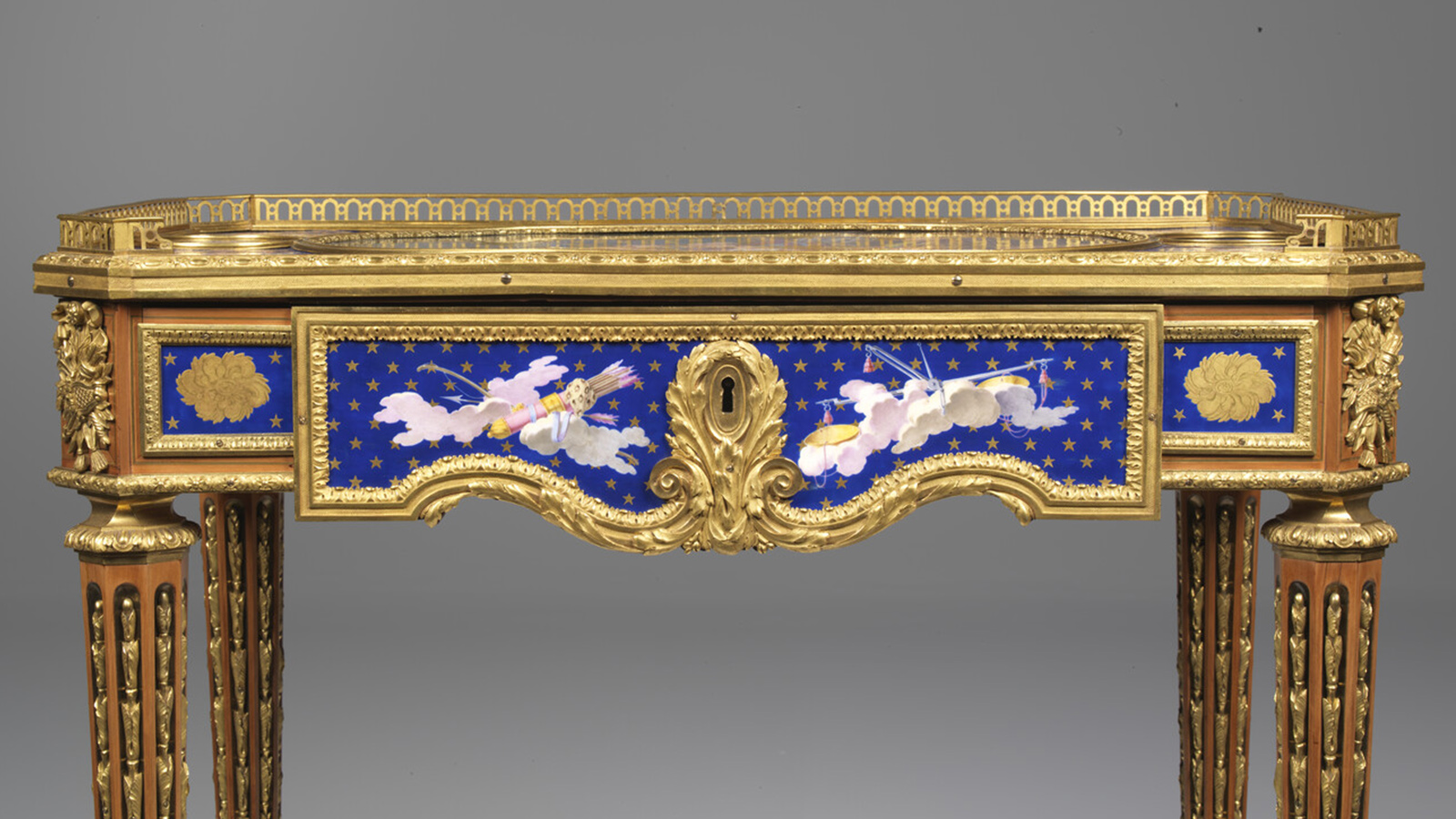 Martin Carlin and Charles-Nicolas Dodin, Writing table. Paris, c. 1772. Oak, exotic woods, Sèvres porcelain and bronze. Calouste Gulbenkian Museum
