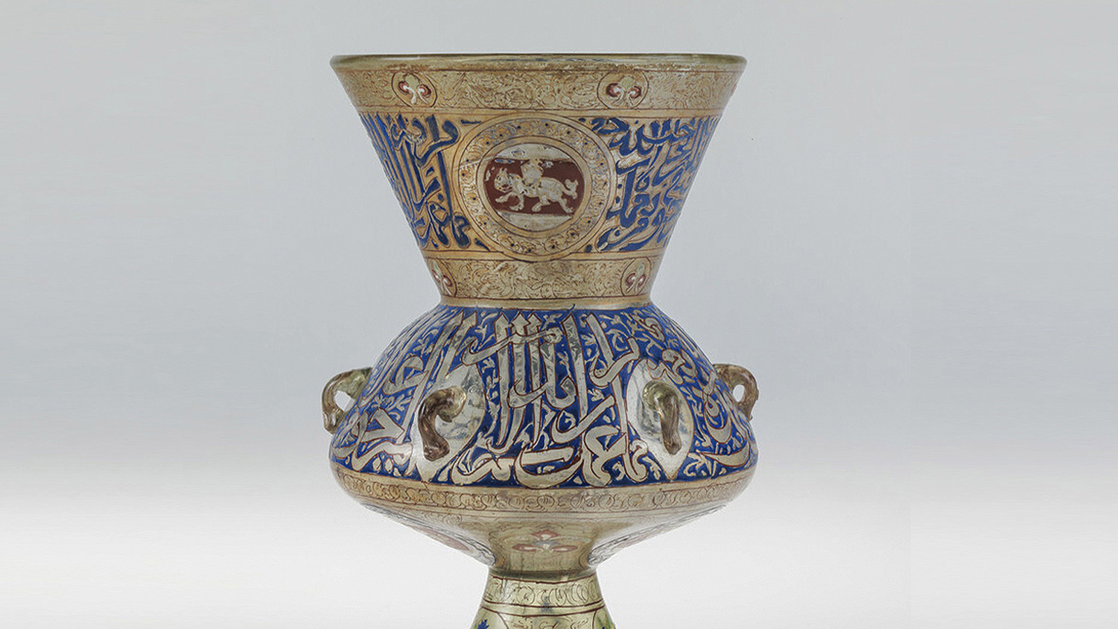 Mosque lamp made for Amir ‘Ali ibn Baktamur. Egypt (or Syria), Mamluk period, 14th century, after 1321. Glass, enamelled and gilt. Calouste Gulbenkian Museum