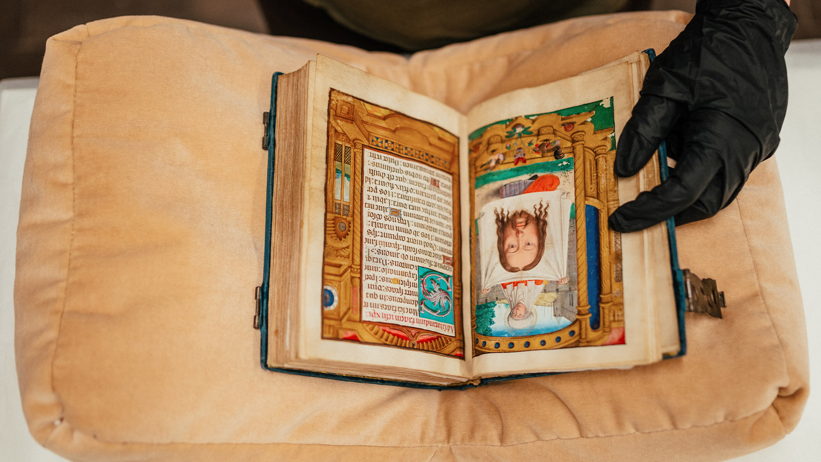 Caption: Conservator Ana Maria Campino during the process of assessing the state of preservation of a European illuminated manuscript © Pedro Pina