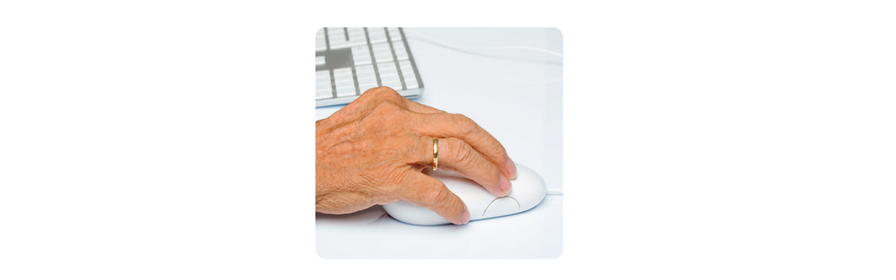 An old person using a mouse
